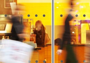 Intentional Blurred Image of People in Shopping Center - Franchising & Hospitality