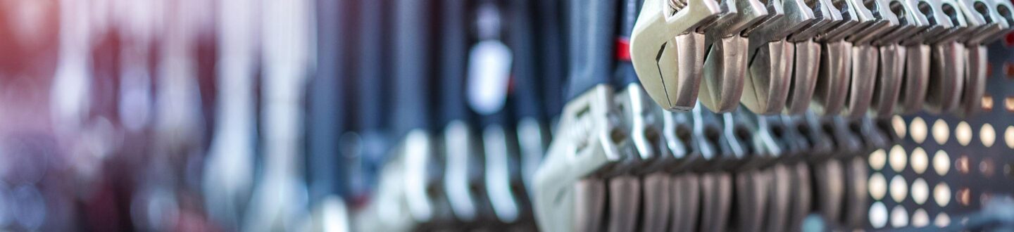 wrenches hanging in a hardware shop - Strategic Financial Modeling & Planning