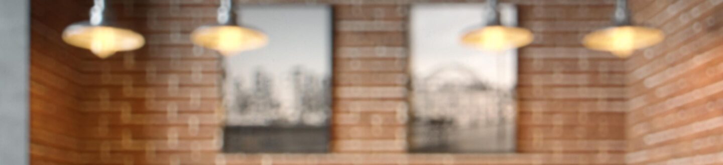 Empty coffee table over defocused coffee shop background with copy space -