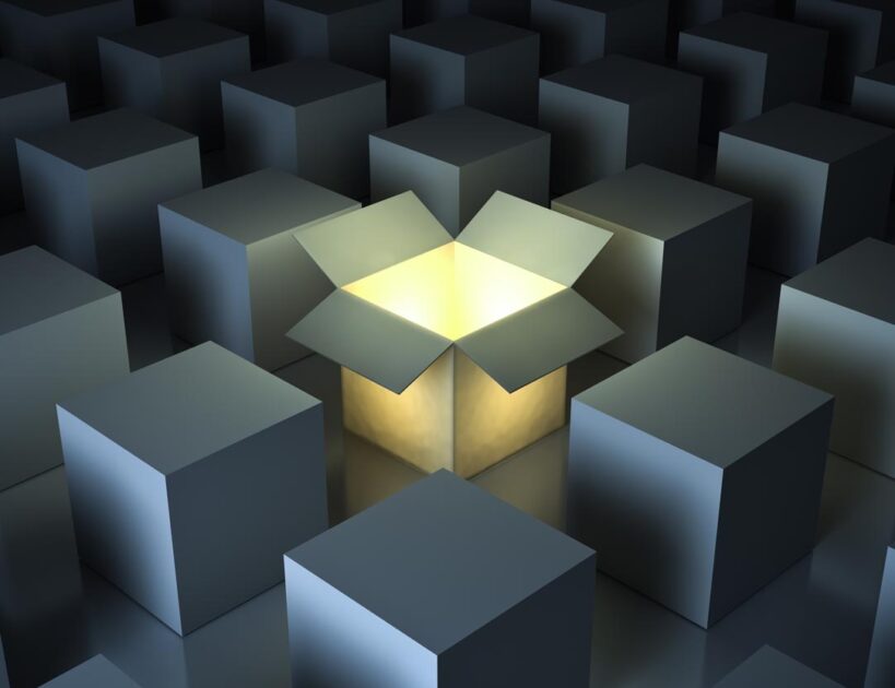 glowing open cardboard box in the middle of a bunch of closed boxes - BW Arpeggio Home